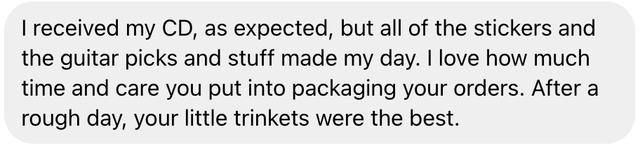 Message from a customer expressing satisfaction with a CD and packaging, including stickers and guitar picks.