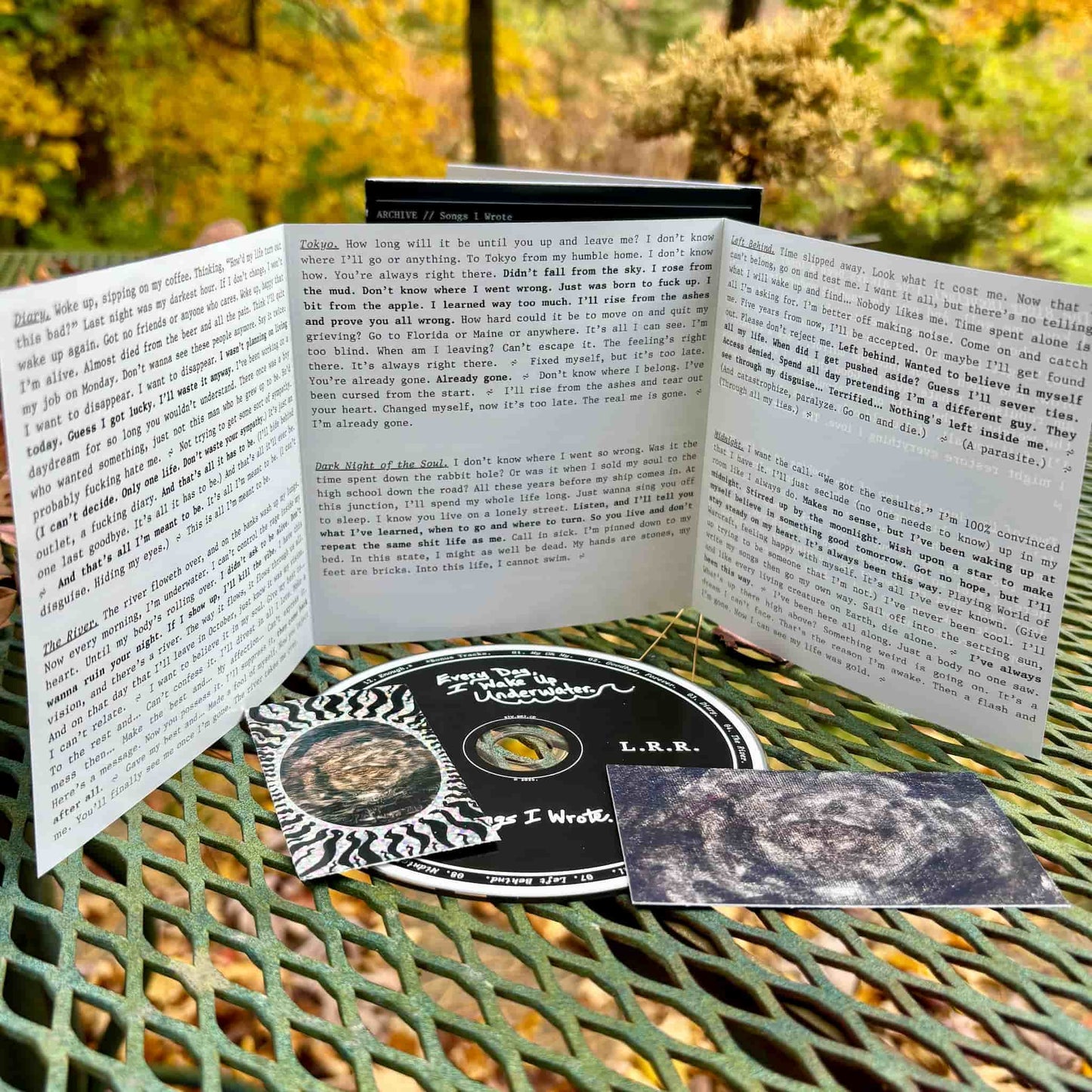 6-panel lyric insert included with the "Underwater" album bundle.